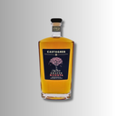 Castagner Grappa Riserva aus Kirschholzfass mit warmem Goldton und Kirschbaum-Motiv.